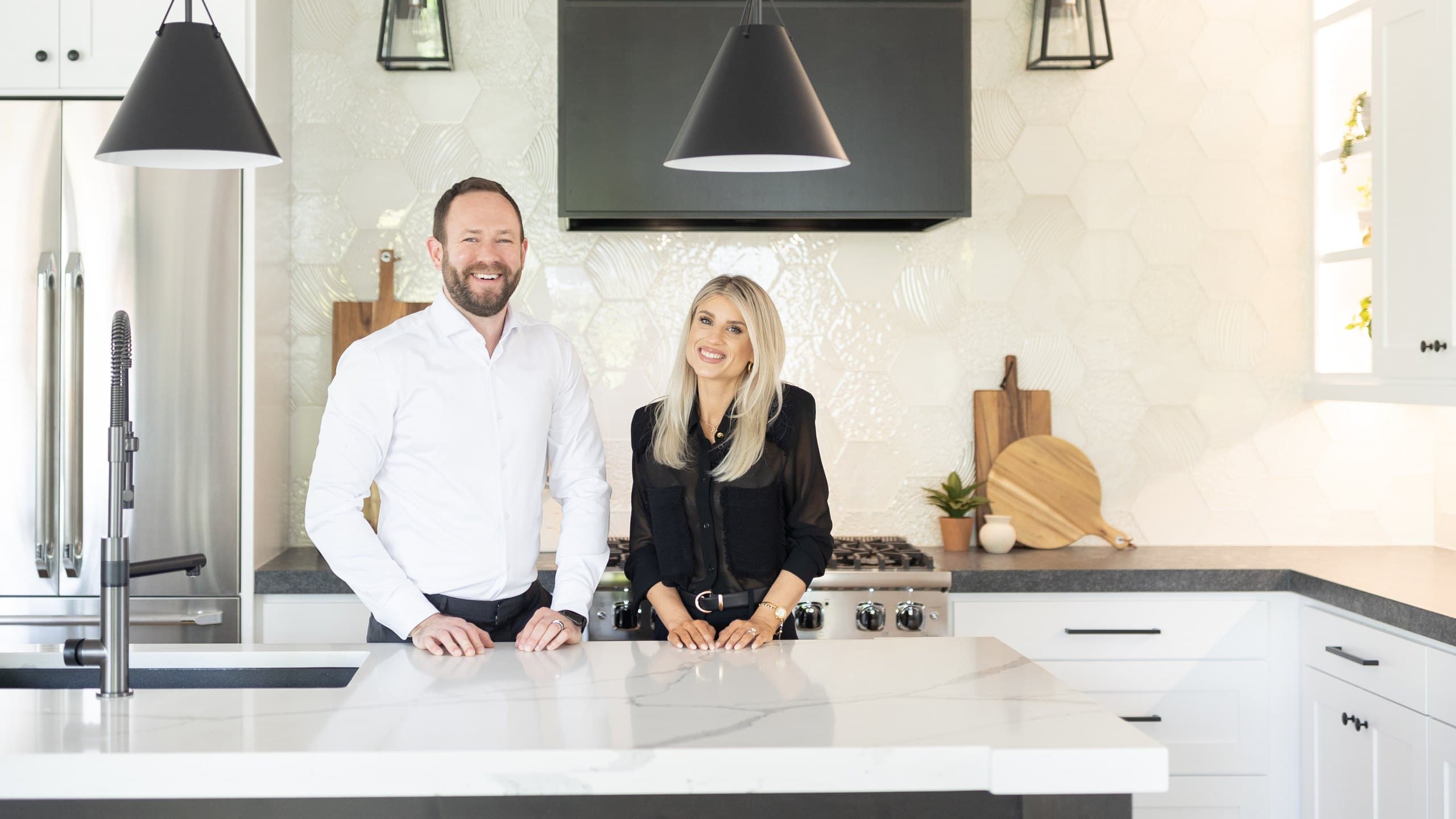Mark and Courtney Reeves at home in the kitchen